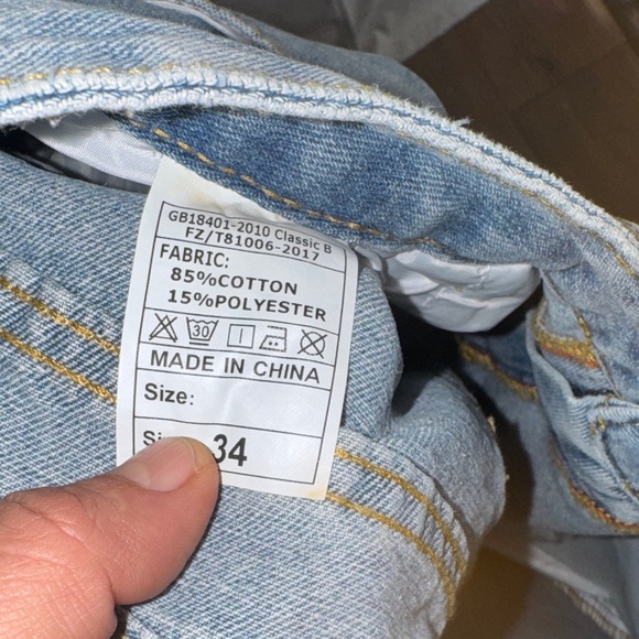 Ripped Jeans with Star Accents - Picture 9 of 16